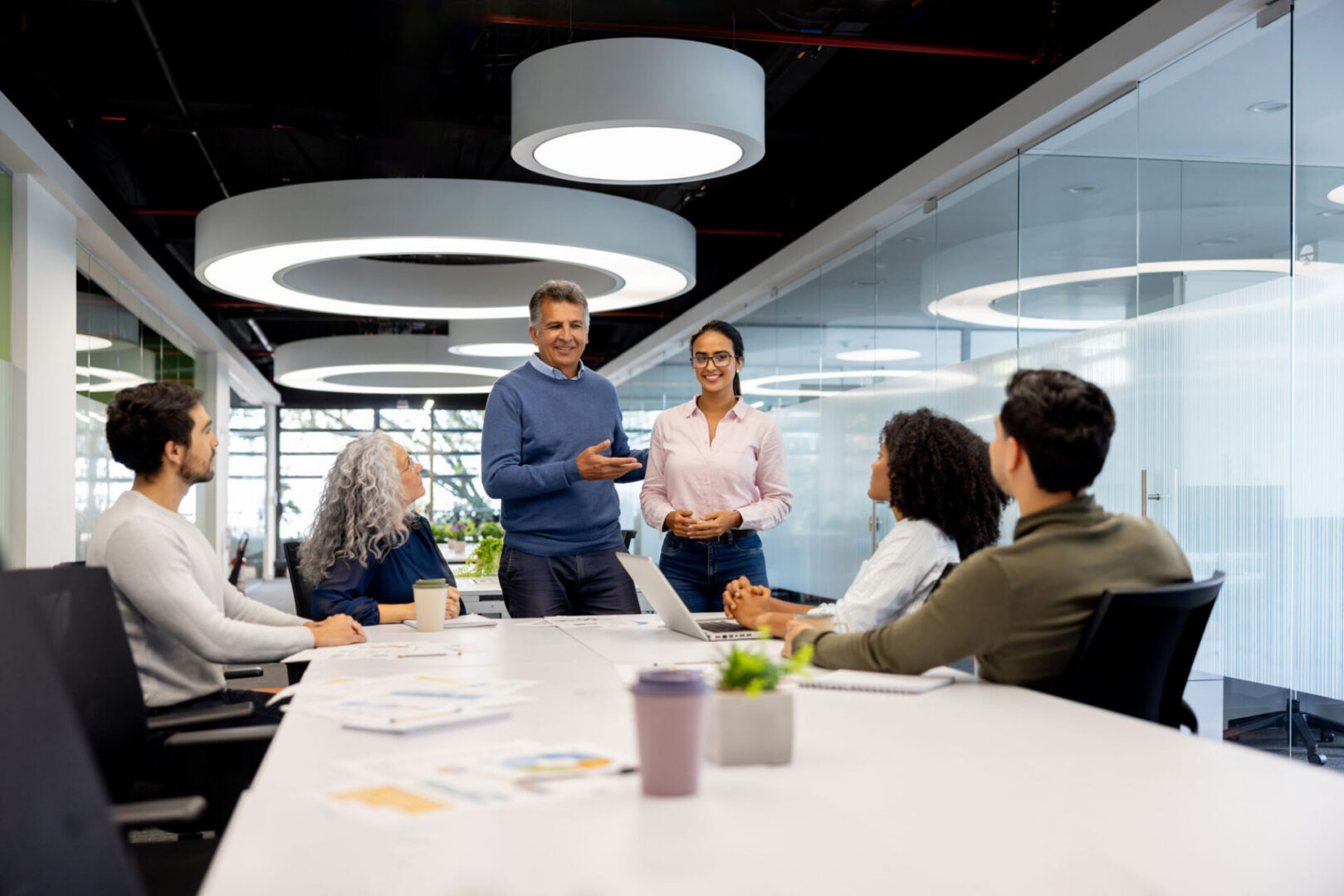 Colleagues collaborating in office setting