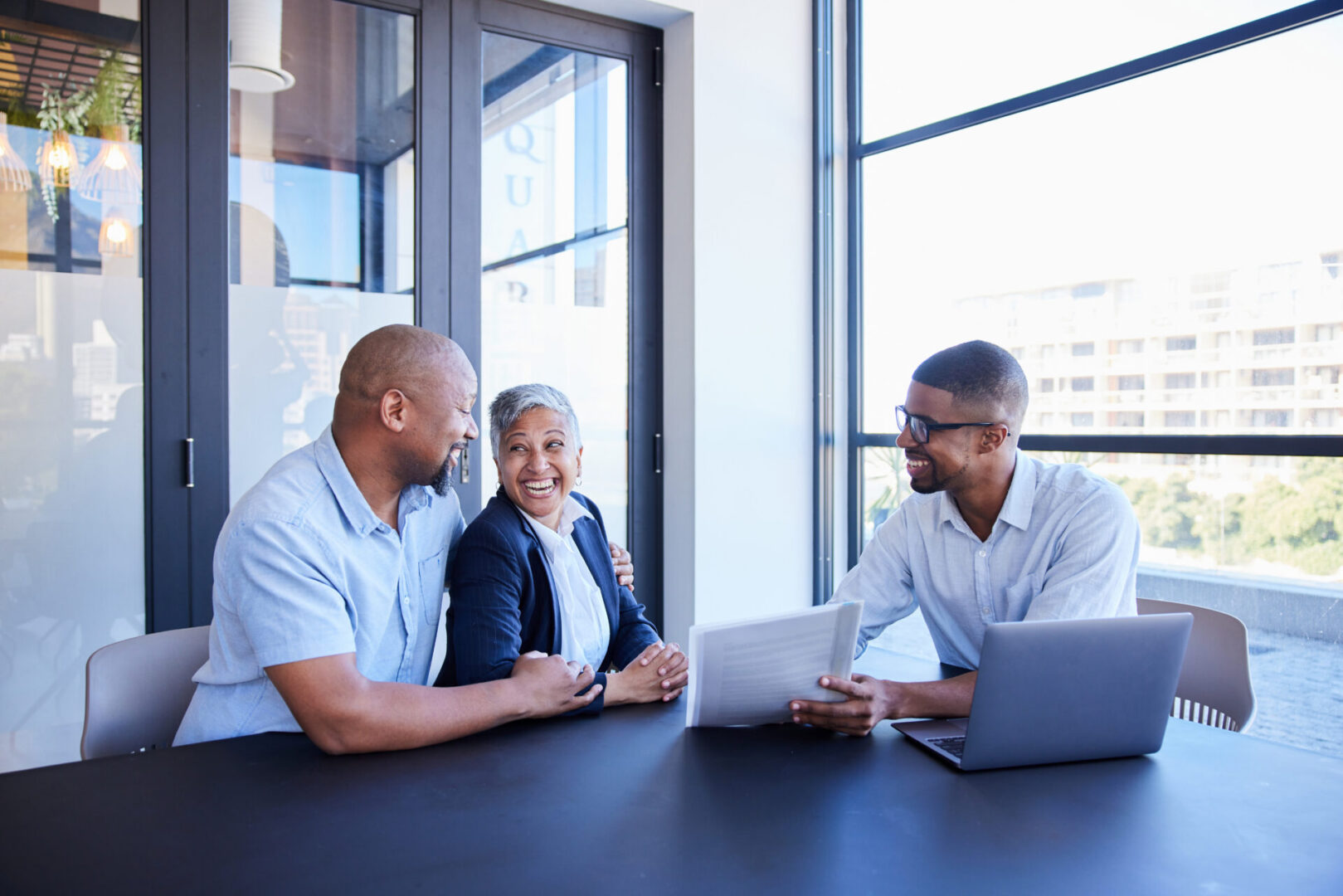 Advisor discussing documents with clients