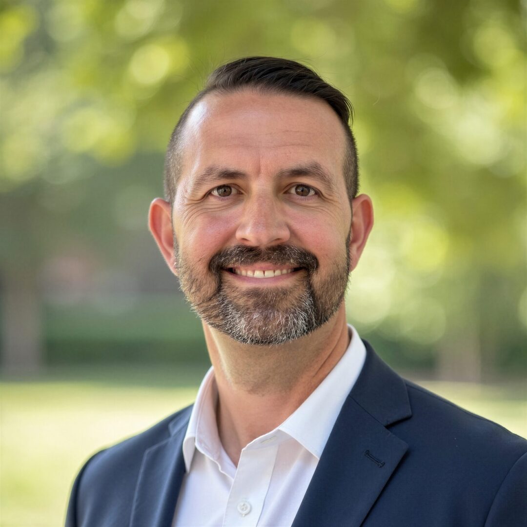 Smiling man in suit outdoors