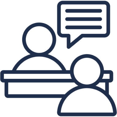 Two figures communicating with speech bubble