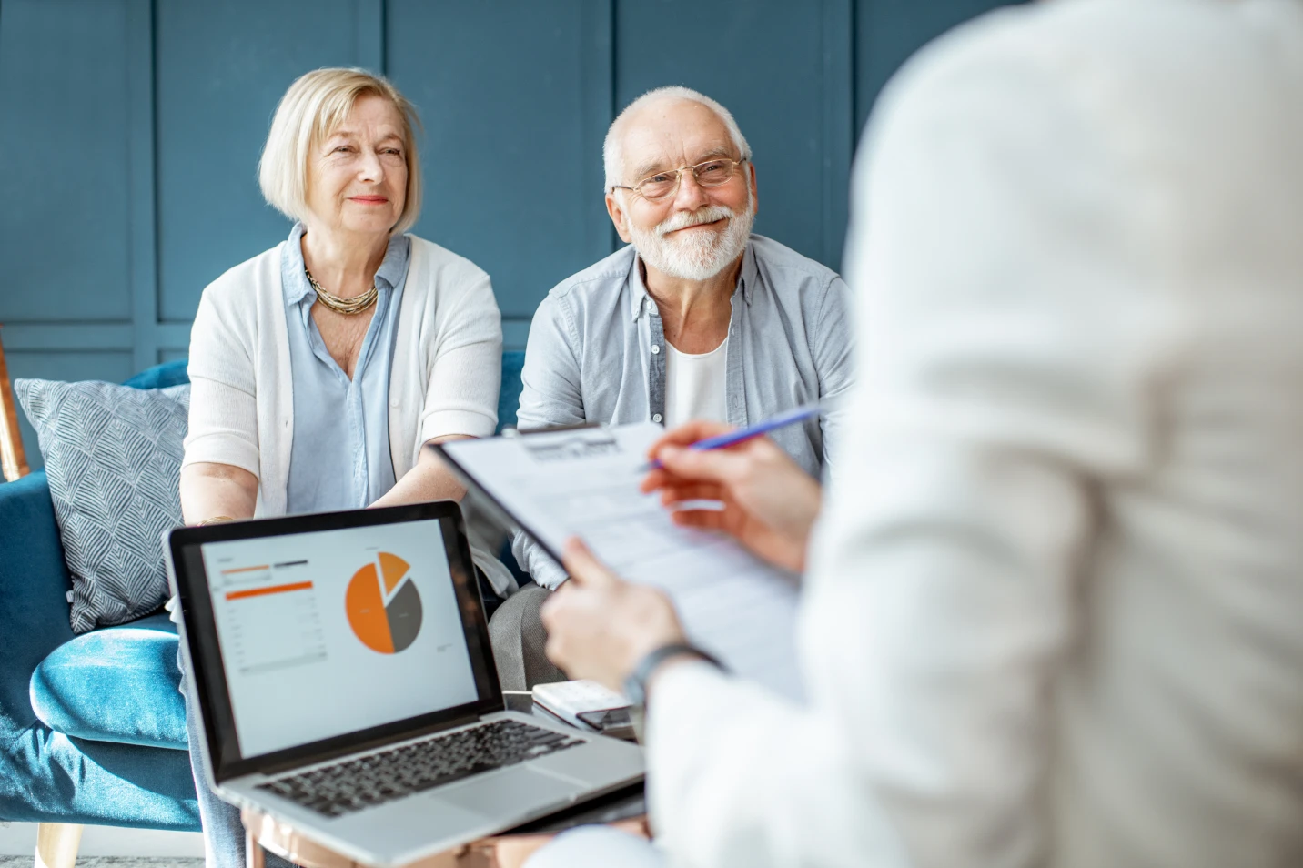 Retirement planning session with elderly couple